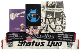 A collection of vintage music memorabilia, to include: Status Quo banners, tour programme and