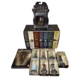A collection of Game of Thrones memorabilia, to include boxed paperback book set, various