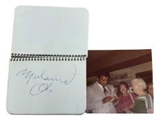 MUHAMMED ALI SIGNATURE: To rear page of a small diary, kept by the vendor during travels to the USA.