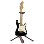 A children's Rockwood/Hohner LX30 electric guitar and stand