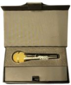 An ADM-803 cased microphone, bearing the signature of Celine Dion, with COA (unauthenticated by Keys