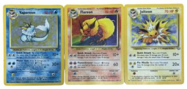 POKEMON TCG 1999 first generation holographics: Jolteon 4/64; Flareon 3/64; 12/64. Moderately