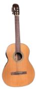 A Cort 6-string acoustic guitar, model number: AC-15-NAT, serial number: CA04095483