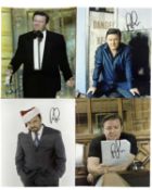 Four colour 8x10 colour photographs bearing the signature of Ricky Gervais (unauthenticated by