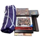 A mixed lot of various Harry Potter memorabilia, to include: - Sleeping bag - Jigsaw puzzle -