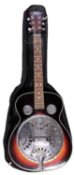 A Martin Smith 6-string blues guitar with steel scratchplate and diamond-shaped fret markers with