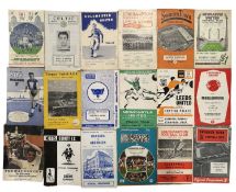 A large collection of vintage football programmes.