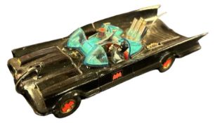 A die-cast Corgi Batmobile with original figures