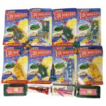 A collection of various vintage 1990s Matchbox Thunderbirds collectable figures, most still carded /