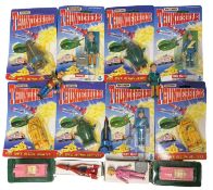 A collection of various vintage 1990s Matchbox Thunderbirds collectable figures, most still carded /