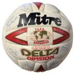 A Mitre football, bearing the signatures of various players, including Ipswich Town's Steve Palmer