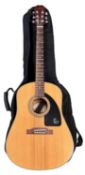 An Epiphone [Gibson] 6-string acoustic guitar with softcase. Model number: AJ-15, serial number: