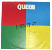 A Queen: Back Chat 12'' vinyl record, bearing the signature from Freddie Mercury, together with