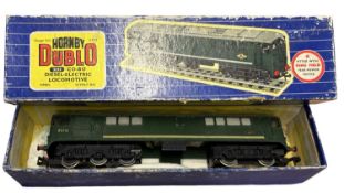 A boxed Hornby Dublo 00 gauge Co-Bo Diesel-Electric locomotive #D5713 in green livery.