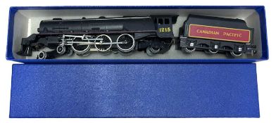 A Hornby Dublo 00 gauge Canadian Pacific 4-6-2 locomotive and tender in black livery, number 1215.