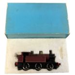 An 0 gauge 0-6-0 Jinty locomotive in maroon livery, probably Bassett-Lowke, in original box