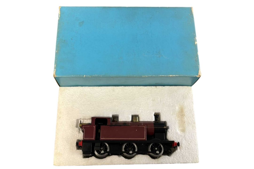 An 0 gauge 0-6-0 Jinty locomotive in maroon livery, probably Bassett-Lowke, in original box - Image 1 of 6