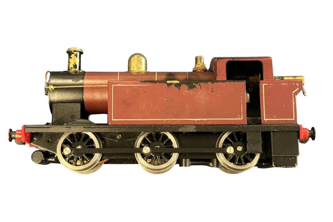 An 0 gauge 0-6-0 Jinty locomotive in maroon livery, probably Bassett-Lowke, in original box - Image 3 of 6