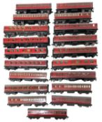 A collection of various Hornby Dublo 00 gauge coaches in maroon livery