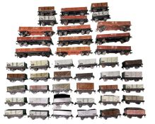A collection of various Hornby Dublo open plank wagons