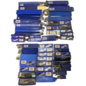 A large collection of boxed Hornby Dublo track sections.