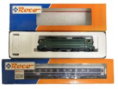 A boxed Roco H0 gauge 43568 diesel engine, together with a 44843 coach (2)