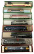 A collection of various 00 gauge diesel engines in generic boxes.