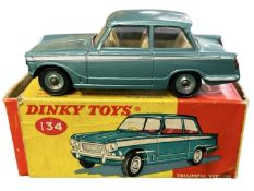 A boxed Dinky Toys 134 metallic green Triumph Vitesse with light grey interior