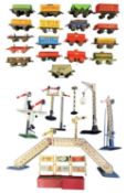 A collecton of 0 gauge tinplate Hornby rolling stock, signals, lights etc