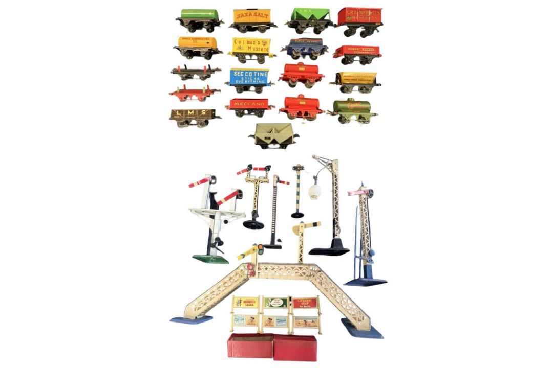 A collecton of 0 gauge tinplate Hornby rolling stock, signals, lights etc