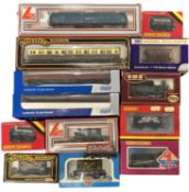 A mixed lot of various boxed 00 gauge coaches and wagons, to include Mainline, Dapol, Hornby etc
