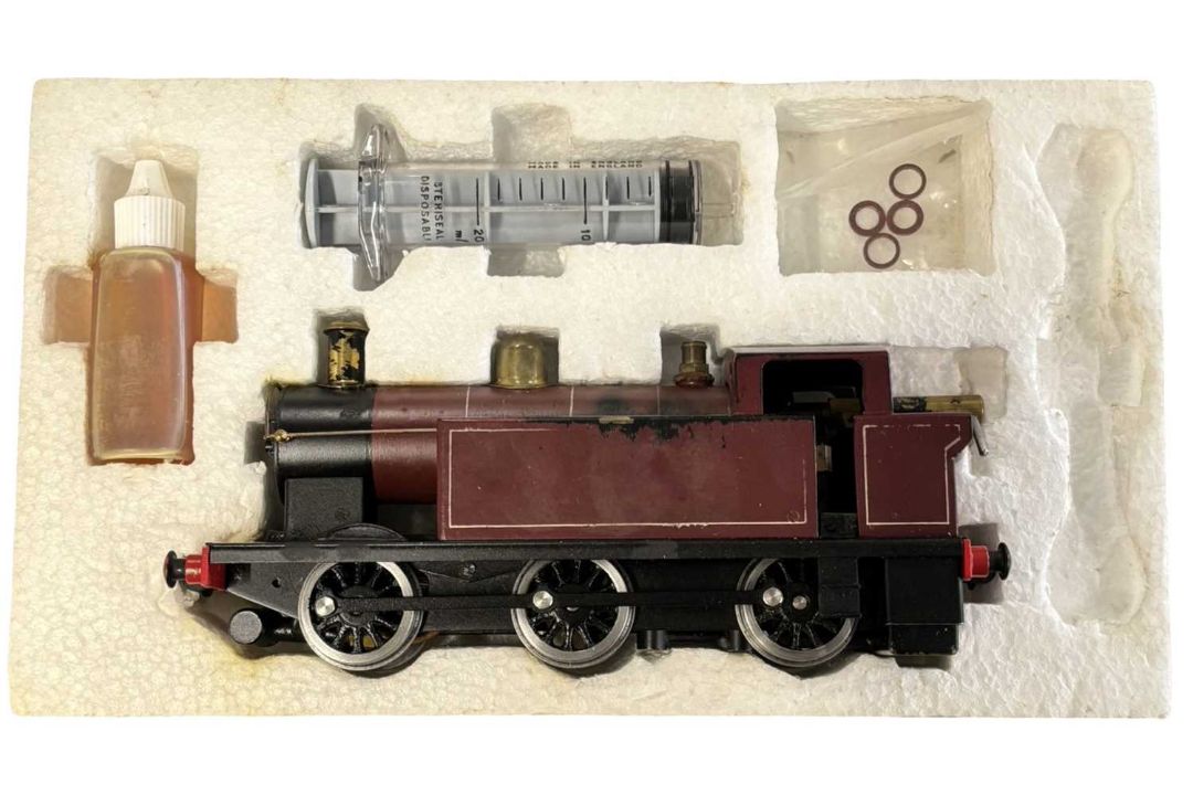 An 0 gauge 0-6-0 Jinty locomotive in maroon livery, probably Bassett-Lowke, in original box - Image 2 of 6