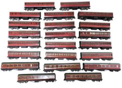 A collection of various Hornby Dublo 00 gauge coaches in maroon livery