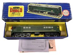 A boxed Hornby Dublo 00 gauge Co-Bo Diesel-Electric locomotive #D5713 in green livery.