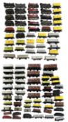A collection of various 00 gauge rolling stock, mostly Lima