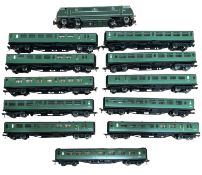 A Fleischmann 00 gauge 'Greyhound' D821 diesel engine, together with a collection of coaches in