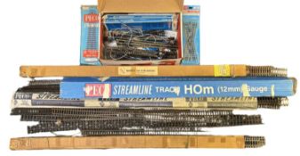 A collection of model railway straight track lengths, various makes and gauges.