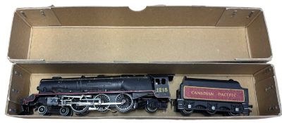 A Hornby Dublo 00 gauge Canadian Pacific 4-6-2 locomotive and tender in black livery, number 1215.