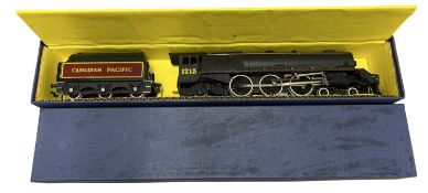 A Hornby Dublo 00 gauge Canadian Pacific 4-6-2 locomotive and tender in black livery, number 1215.
