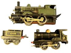 A Hornby 0 gauge 0-4-0 locomotive and tender in black livery, plus one other unmarked example