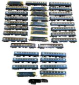 A collection of various Lima 00 gauge diesel engines and Inter-City coaches in blue livery