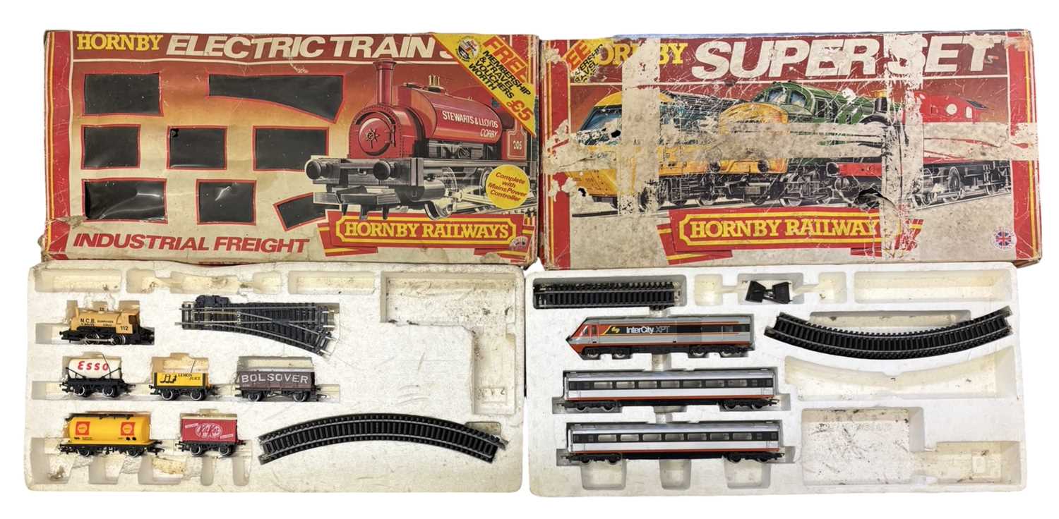 A pair of incomplete Hornby 00 gauge train sets, to include: - R583 Industrial Freight - Intercity