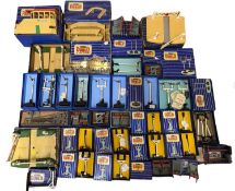 A collection of various boxed Hornby Dublo signals, buffer stops, crossings etc