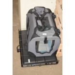A dog cage and pet carrier