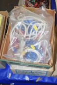 Two boxes of various leads and electrical accessories