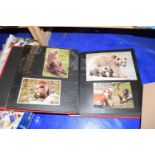 Photograph album containing large quantity of various modern postcards of animals