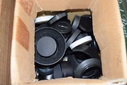 Quantity of various camera lens caps