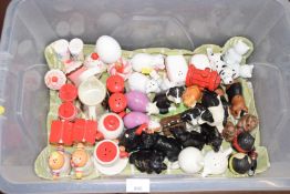 Box containing a collection of novelty salt and pepper