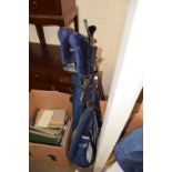 Golf bag with clubs and trolley