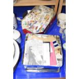 Two tins of used stamps